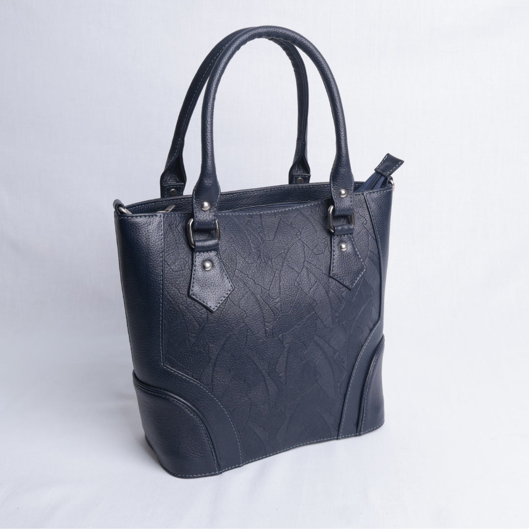 Bolso Mano Azul Texturizado – Nahué Atelier
