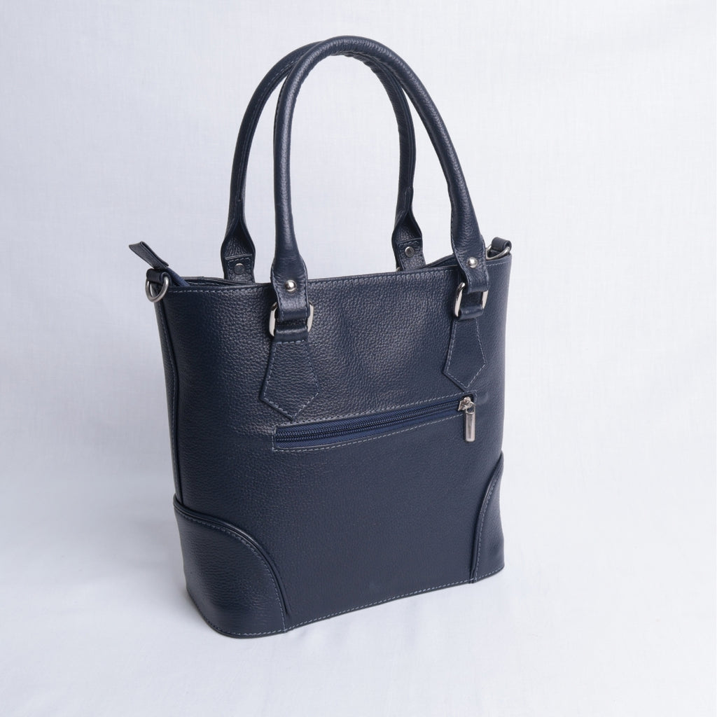 Bolso Mano Azul Texturizado – Nahué Atelier