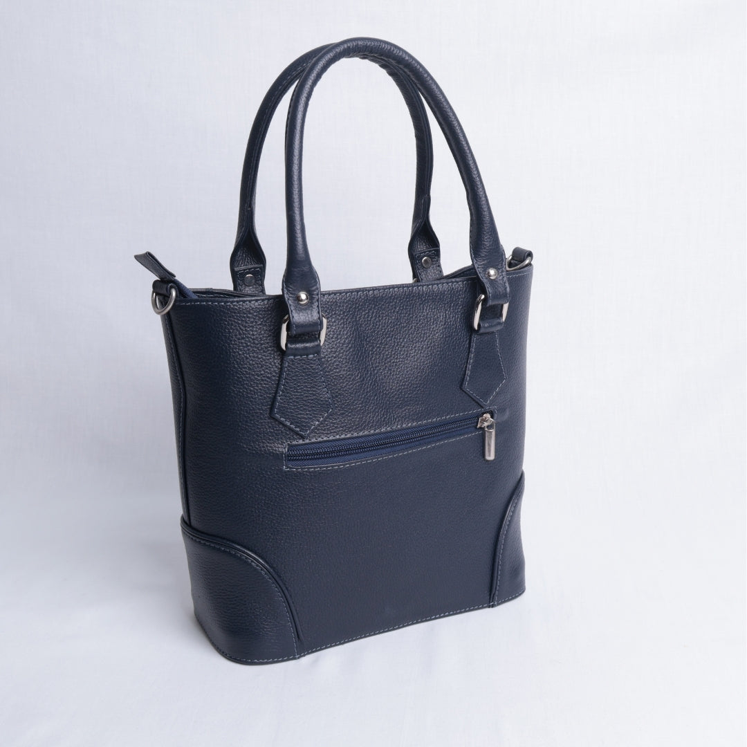 Bolso Mano Azul Texturizado – Nahué Atelier