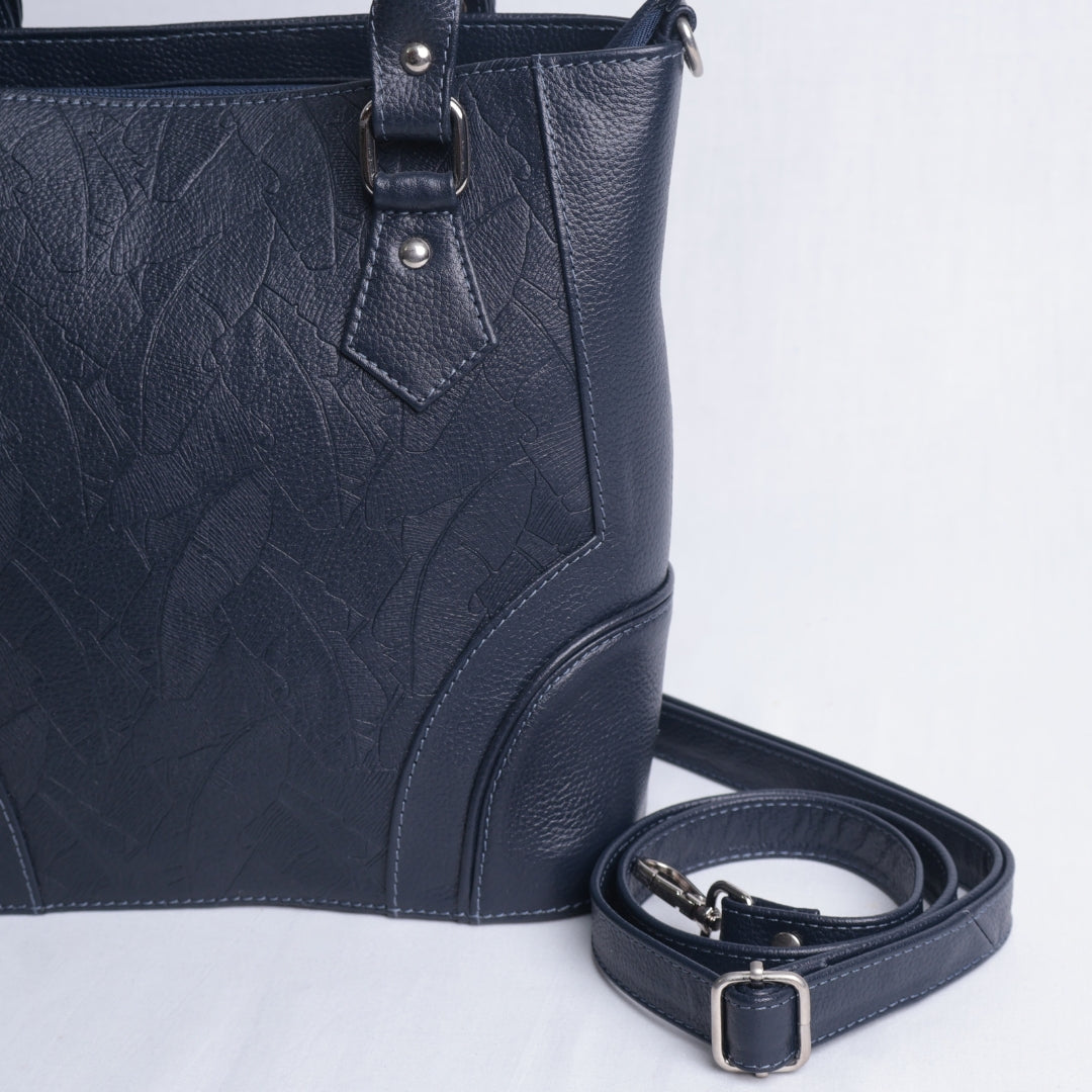 Bolso Mano Azul Texturizado – Nahué Atelier